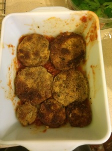 sauce on bottom, first layer of eggplant rounds